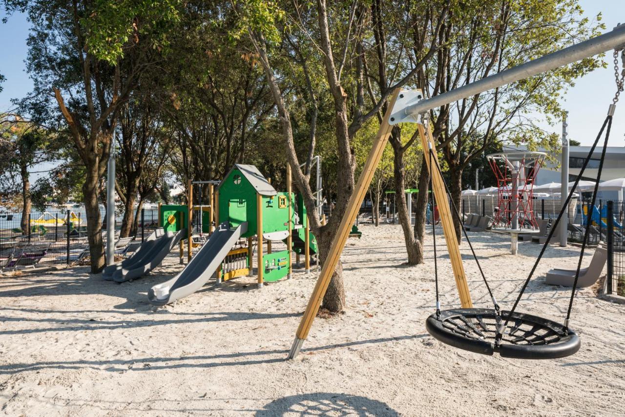 Falkensteiner Premium Mobile Homes And Camping Zara Esterno foto Playground in the park